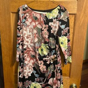 Black Floral faux wrap dress.  Slimming liner Size Medium